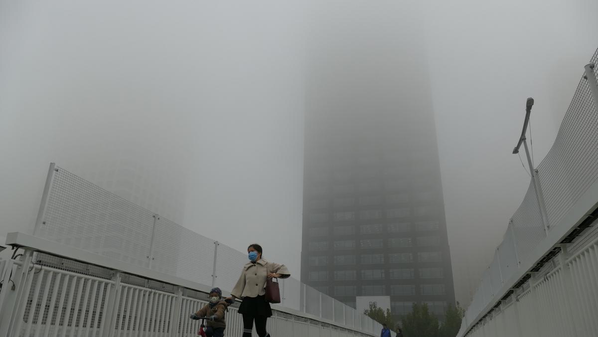 UNCLEAR Heavy fog in Tianjin, China. The country officially plans to become “carbon neutral by 2060, but climate experts aren’t satisfied