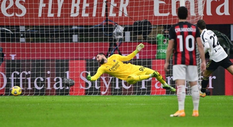 Juventus forward Federico Chiesa (R) scored a brace as AC Milan's 27-match unbeaten run ended.