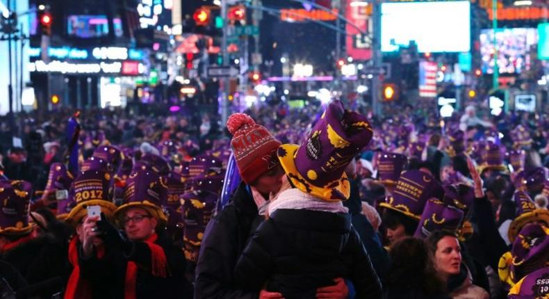 New Year festivities in New York, where a crowd estimated at nearly a million packed into Times Square, went off without a hitch amid tight security