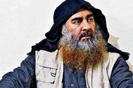 Late Islamic State leader Abu Bakr al-Baghdadi is seen in an undated picture released by the U.S. Department of Defense