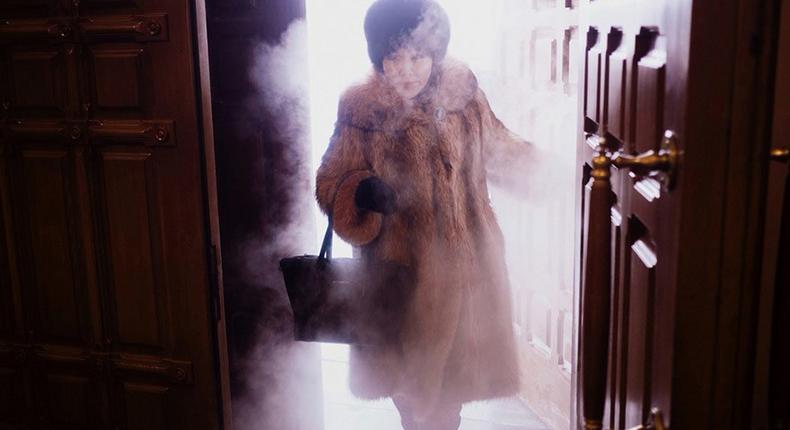 A woman enters the city cathedral in Yakutsk