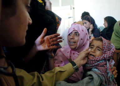 PAKISTAN-WEATHER-FLOOD-VICTIM-CHILD