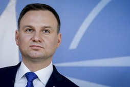 Polish President Andrzej Duda is welcomed by NATO Secretary General Jens Stoltenberg