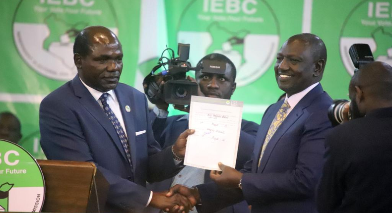 File image of President-elect William Ruto receiving his certificate from IEBC chairman, Wafula Chebukati after he was declared the President-elect on 15 August 2022