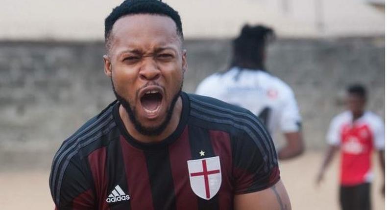 Singer Flavour celebrating a goal. 