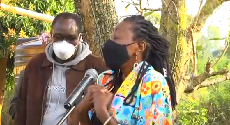 Actress, radio presenter Jacqueline Nyaminde Wilbroda addresses mourners during the burial of Charles Bukeko alias Papa Shirandula