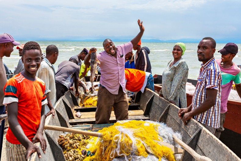 Fishermen at the Lake George, Uganda. [Getty Images]