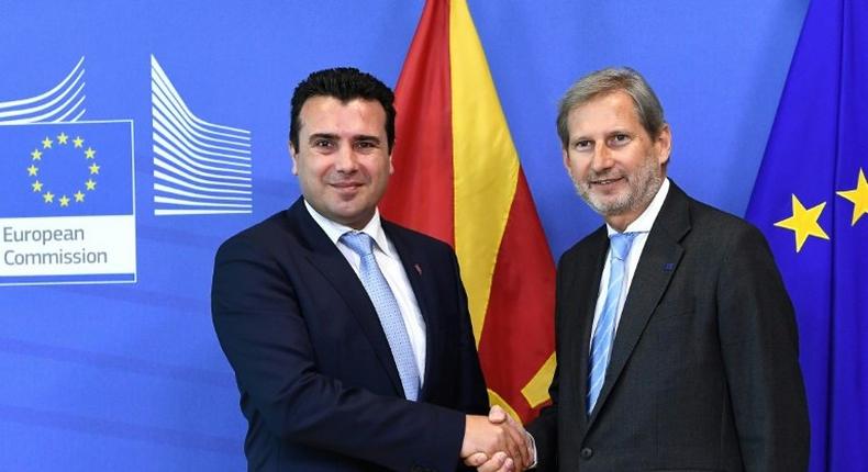 Macedonian Prime Minister Zoran Zaev (L) with Commissioner of European Neighbourhood Policy and Enlargement Negotiations Johannes Hahn, at the European Commission in Brussels, where Zaev hopes to renew discussions of Macedonia joining NATO and the EU