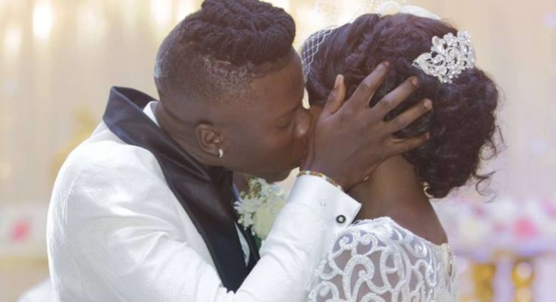 Stonebwoy kisses wife Dr Louisa during-their-wedding