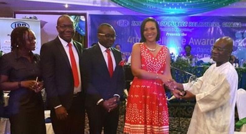 Hannah Agbozo, Legal & Corporate Affairs Director- Airtel Ghana (4 from left) receiving the plaque at the awards.