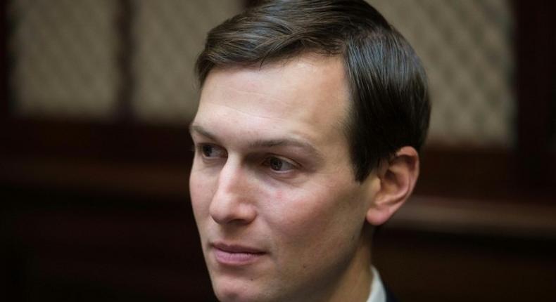 President Donald Trump is standing beside son-in-law and top aide Jared Kushner amid allegations that he attempted to set up a back-channel to Moscow