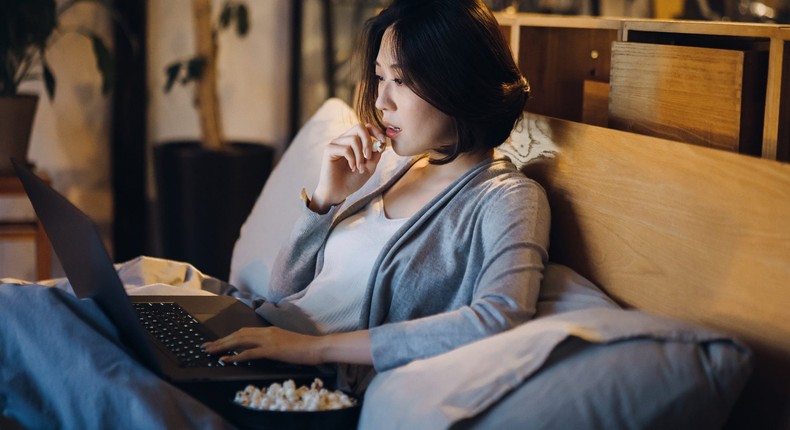 Eating highly processed, high-calorie foods late at night can disrupt your quality of sleep.AsiaVision / Getty Images