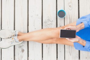 Young woman using smart phone