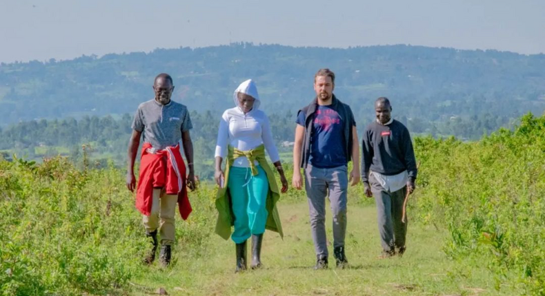 Akothee, Mr Schweizer and workers take a stroll of Akothee's expansive farm