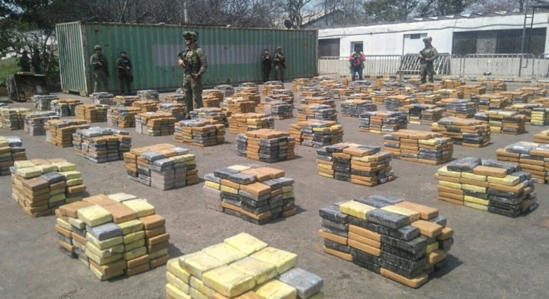 This handout picture released by the Colombian Antinarcotics Police shows 6,184 kilos of cocaine -which was heading to the port of Algeciras, Spain- seized in Barranquilla, on April 2, 2017