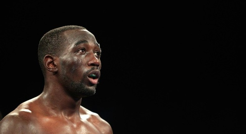 Terence Crawford (pictured) defended his WBO and WBC belts on December 10, 2016, by stopping John Molina in the eighth round of their junior welterweight title fight