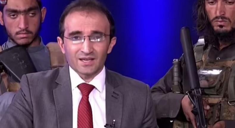 Armed Taliban militants storm TV studio, surround presenter with guns while he reads news