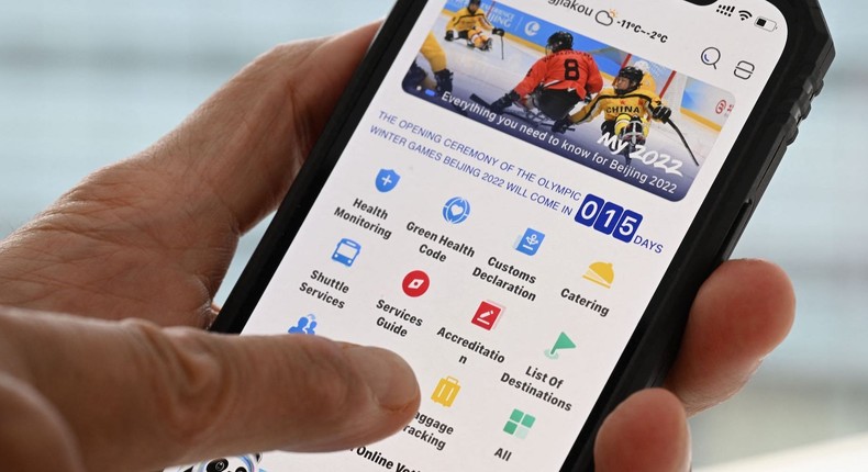 A phone showing the MY2022 Winter Olympic Games app in Beijing on January 20, 2022.