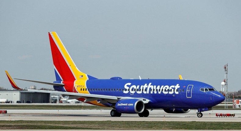 A Southwest Airlines Boeing 737-7H4 jet taxis to the gate.