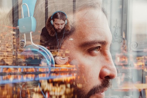 Multiple exposure photo of man with headphones