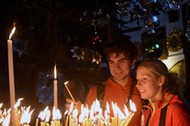 Christians Light Candles In Church Of Nativity In Bethlehem