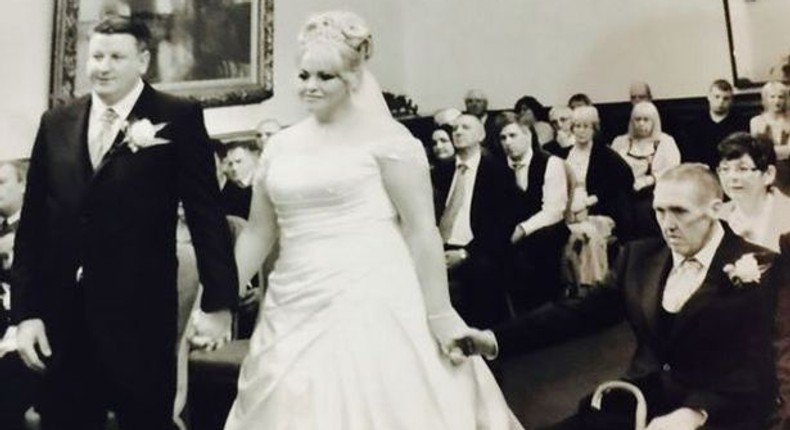 Kelly Galt marrying her husband Alan while holding her father's hand