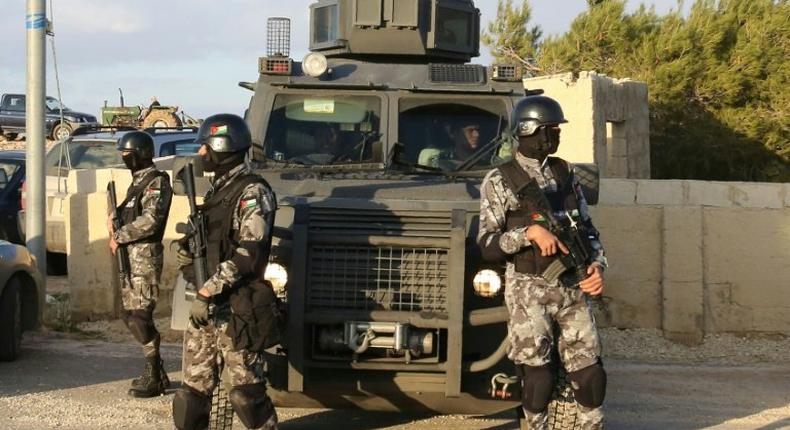 Jordanian security forces on duty during a funeral for the victims of a weekend attack in Karak, on December 19, 2016