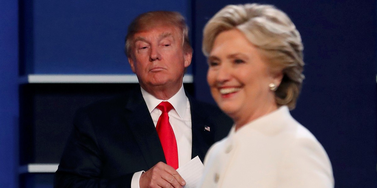 Donald Trump and Democratic U.S. presidential nominee Hillary Clinton finish their third and final 2016 presidential campaign debate at UNLV in Las Vegas, Nevada, U.S., October 19, 2016.