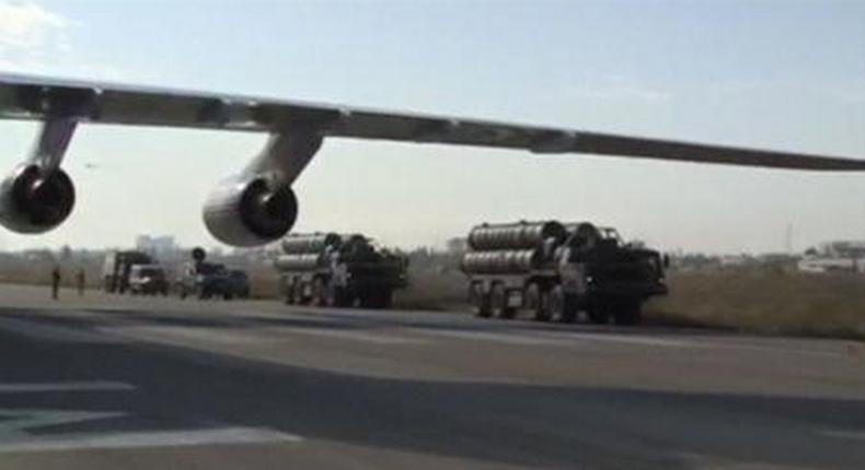 A frame grab taken from footage released by Russias Defence Ministry November 26, 2015, shows Russian S-400 defense missile systems (R) driving on the tarmac of Hmeymim airbase in Syria.