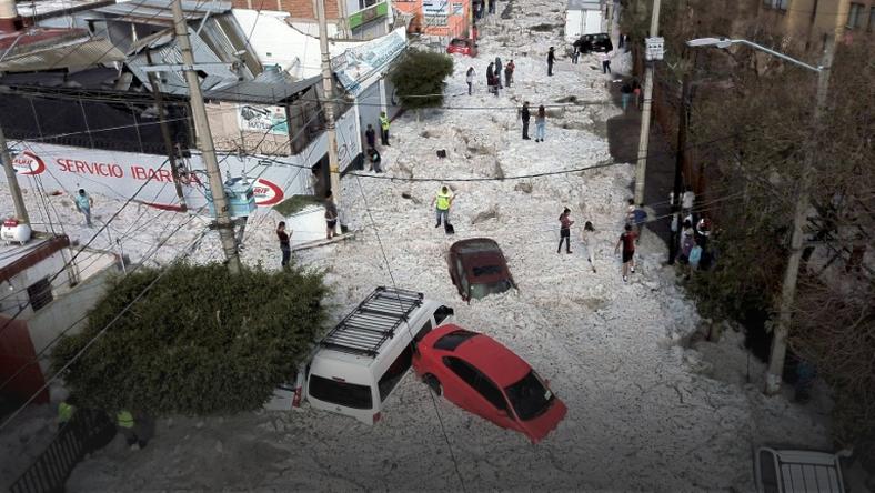 A freak heavy hail storm damaged buildings and buried cars and trucks in the area around Guadalajara, Mexico