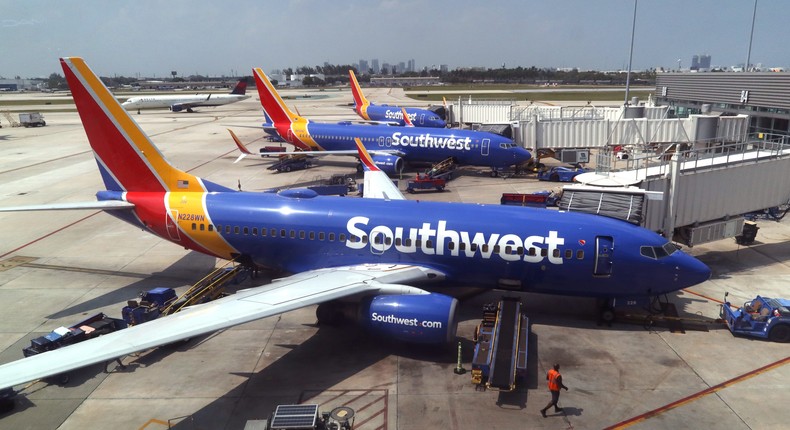 Southwest Airlines is reducing seat pitch on over half of its planes.Gary Hershorn/Getty Images