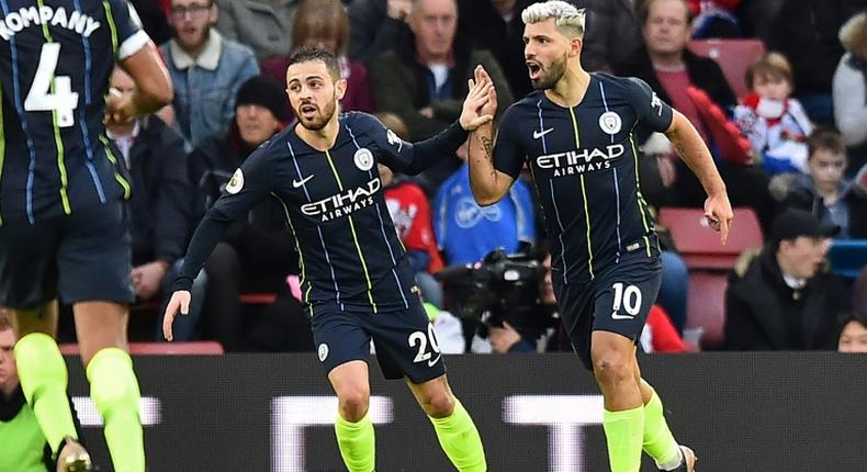 Back in business: Sergio Aguero (right) scored in Manchester City's 3-1 win over Southampton