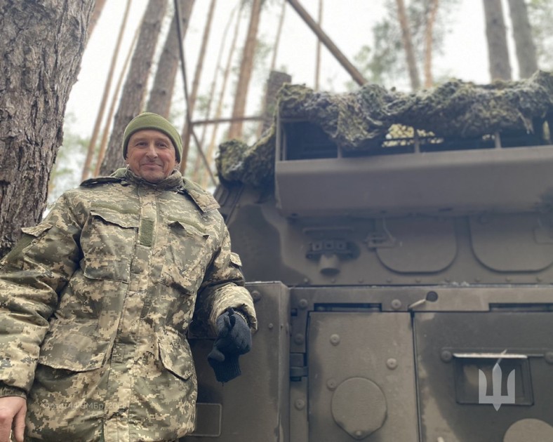 Ukrainian soldier against the background of cancer
