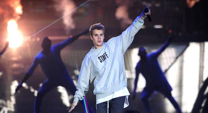 Justin Bieber, performing at the Manchester Arena.