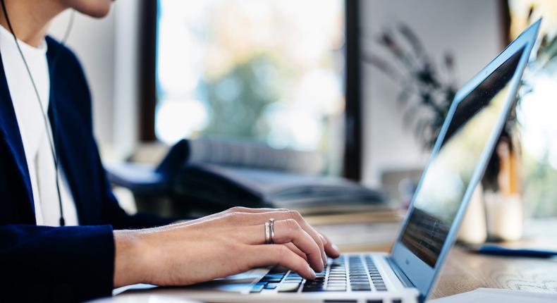 Businesswoman working on laptop in the office