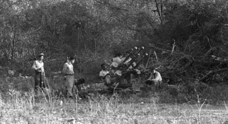 Picture dated April 1961 of Cuban troops using soviet-made anti-aircraft guns during the unsuccessful US-planned and funded Bay of Pigs Invasion