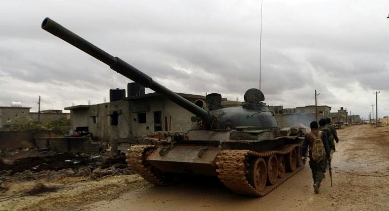 Soldiers from the Libyan National Army, led by Khalifa Haftar, advance towards the area of Qanfudah, south of Benghazi, on November 30, 2016