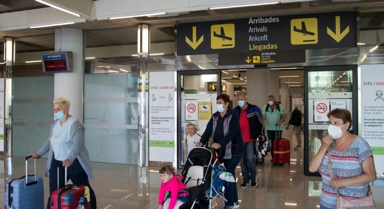 Tourists arrive in Palma de Mallorca, Spain, in June 2020 as the European Union eased coronavirus travel restrictions that remain in place for Americans who want to visit