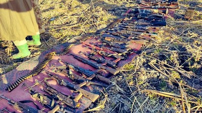 Military kills scores of suspected terrorists, recovers large cache of arms. [Twitter/@HQNigerianArmy]