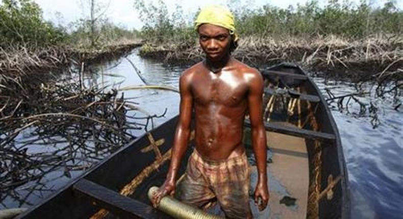 A Niger-Delta fisherman in the creeks