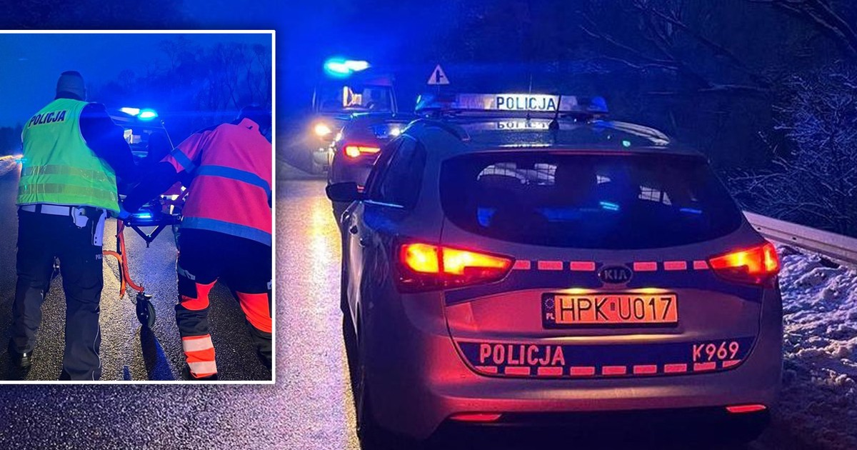 Opel na poboczu z włączonymi światłami awaryjnymi