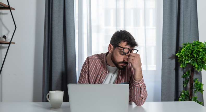 Young freelancer business man working at home in home officeSrdjanns74