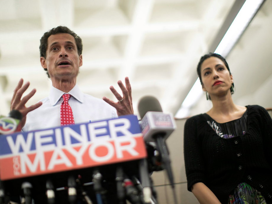 Anthony Weiner appears at a July 2013 press conference with his wife, Huma Abedin.