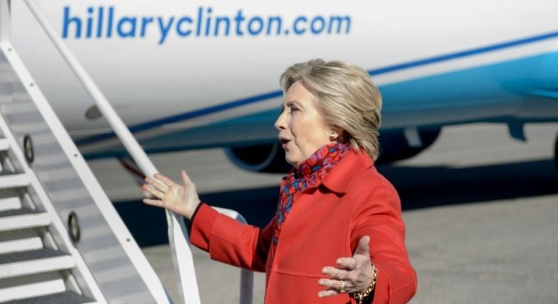 Democratic presidential candidate Hillary Clinton speaks to the press before boarding her plane at Westchester County Airport, New York, on November 7, 2016