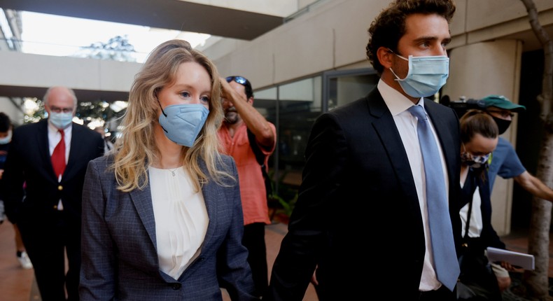 Theranos founder Elizabeth Holmes and her partner Billy Evans leaves the Robert F. Peckham U.S. Courthouse after the delivery of opening arguments in her trial, in San Jose, California, U.S., September 8, 2021.
