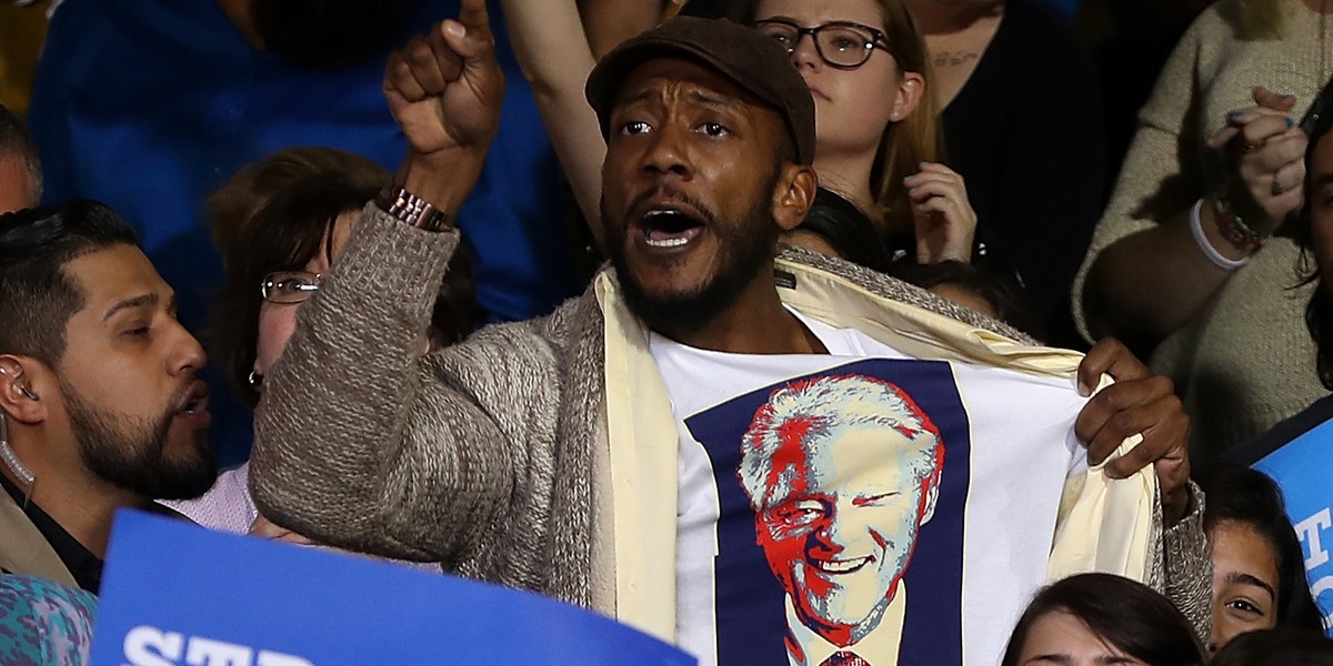 Clinton campaign responds to increasing number of protesters shouting 'Bill Clinton is a rapist'