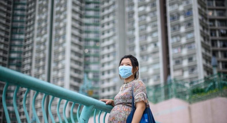 Jamie Chui has been a virtual prisoner in her Hong Kong home for most of her pregnancy, trapped intially by violent pro-democracy protests and tear gas, and then by the coronavirus -- she now faces giving birth alone