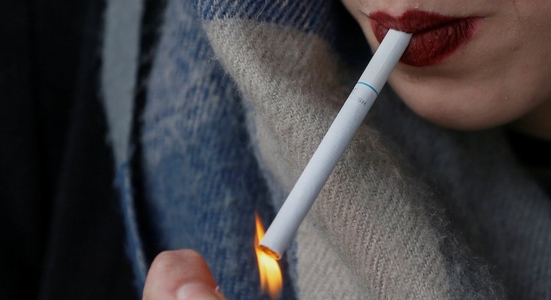 woman smoking cigarette