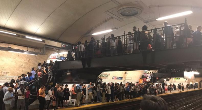 The 168th Street station was packed with commuters after a Monday track fire caused massive delays.