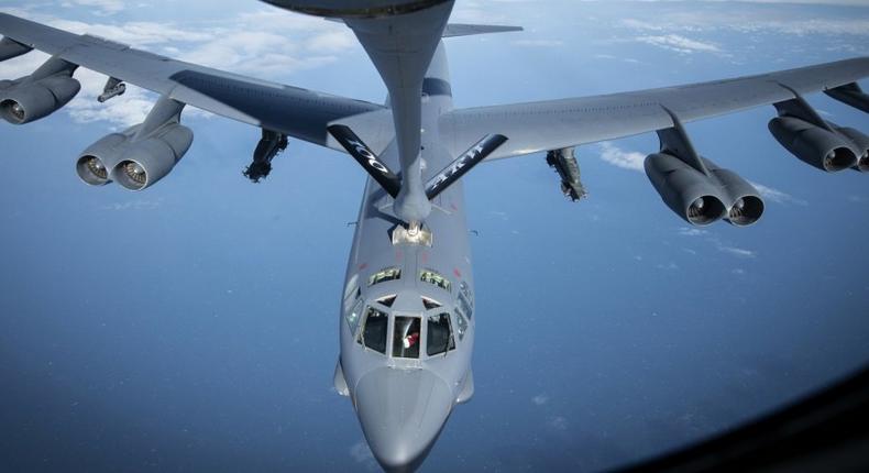 A U.S. Air Force B-52 Stratofortress receives fuel from a KC-135 Stratotanker from the 100th Air Refueling Wing, RAF Mildenhall, England, above the coast English coast, March 14, 2019.